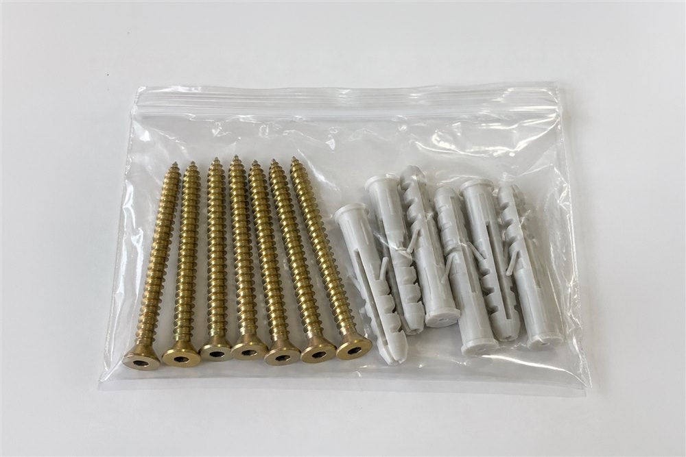 The wall-mounting screws and plastic wall plugs included in the box